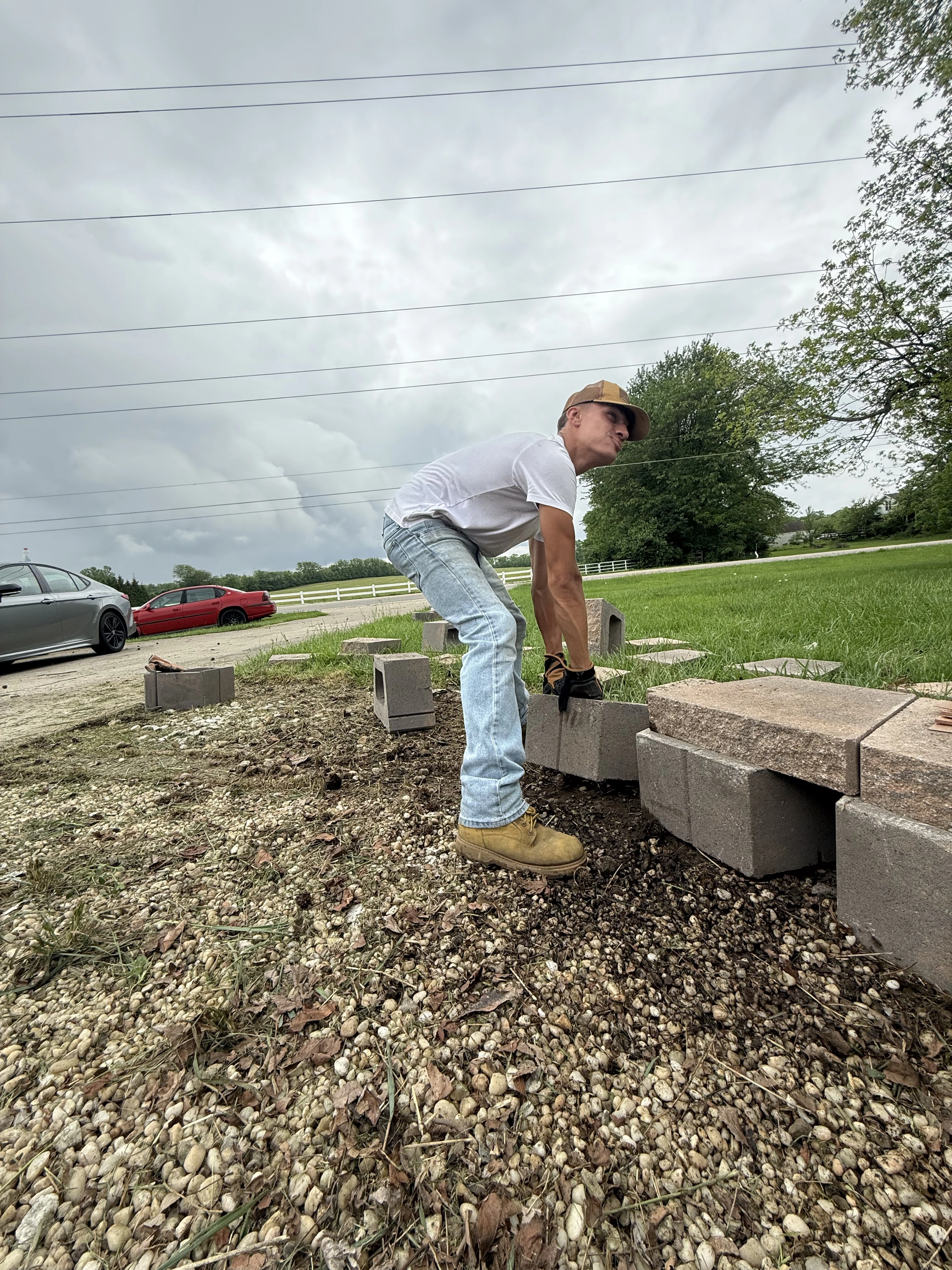 Gabe laying retaining wall